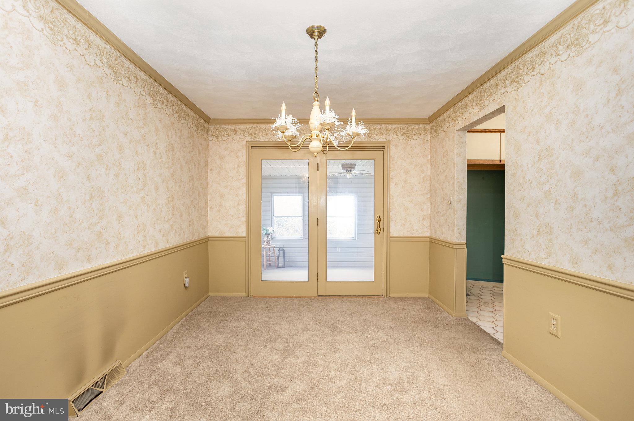 32 Bishop Road Mechanicsburg, PA 17055 - Photo 7 of 31 a view of a room with window and chandelier