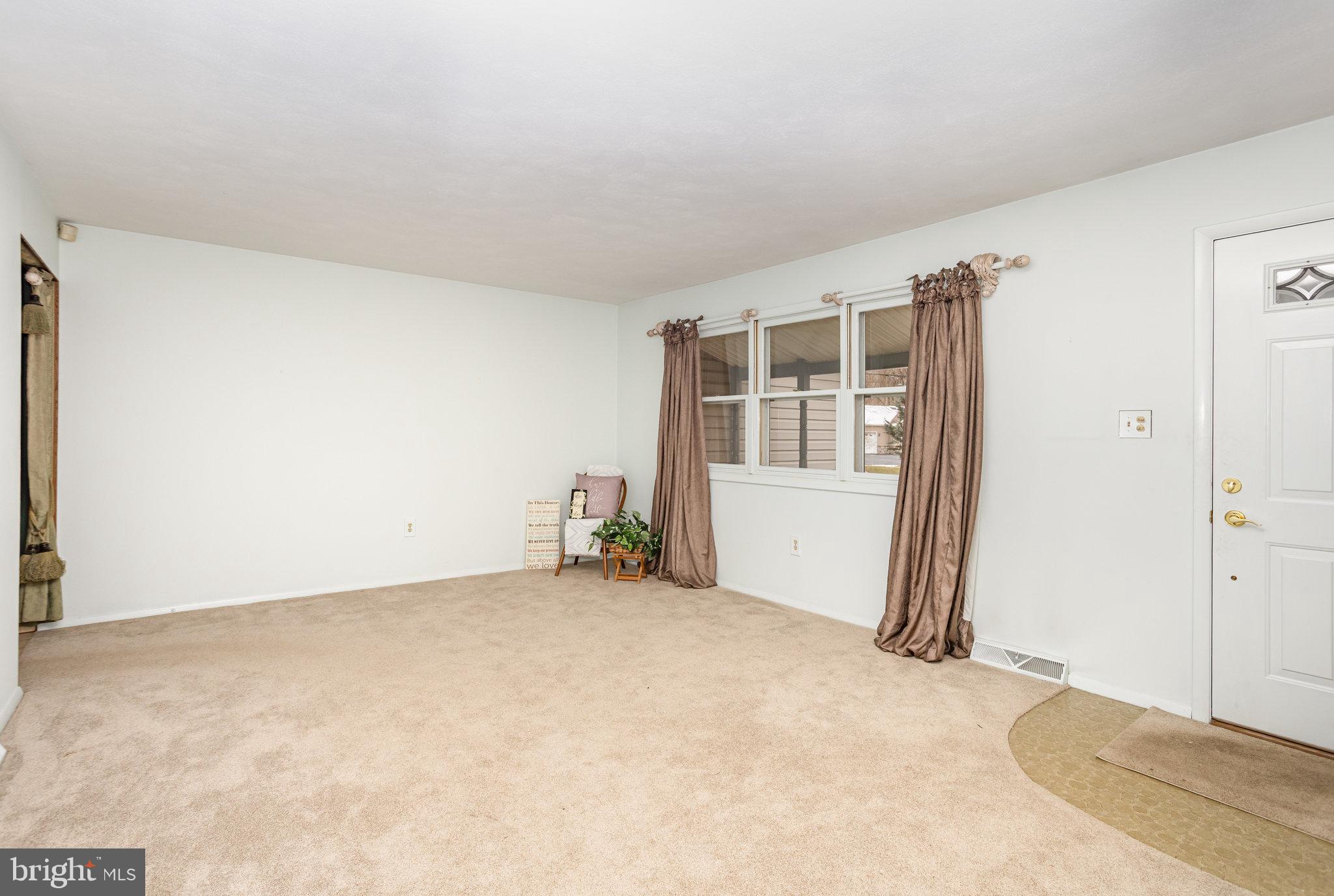 32 Bishop Road Mechanicsburg, PA 17055 - Photo 8 of 31 an empty room with windows
