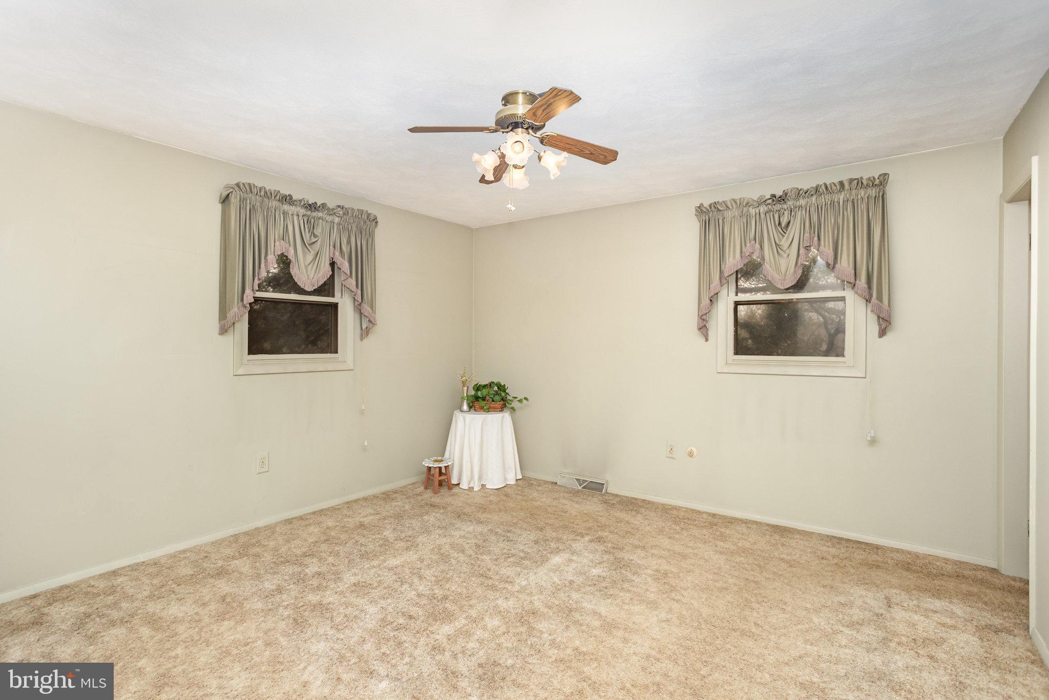 32 Bishop Road Mechanicsburg, PA 17055 - Photo 10 of 31 a view of a room with window and ceiling fan