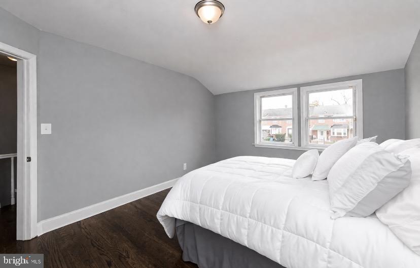 1224 Winston Avenue Baltimore, MD 21239 - Photo 16 of 26 a bedroom with a bed and a window