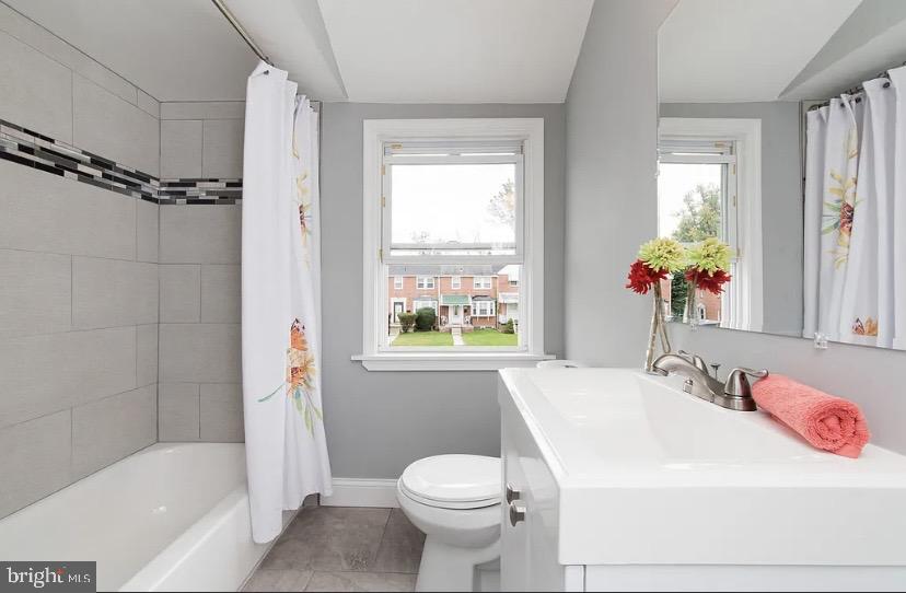 1224 Winston Avenue Baltimore, MD 21239 - Photo 22 of 26 a bathroom with a sink toilet and shower