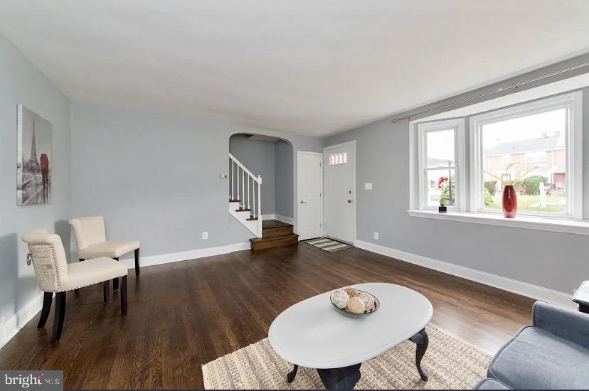 1224 Winston Avenue Baltimore, MD 21239 - Photo 5 of 26 a living room with furniture and a table