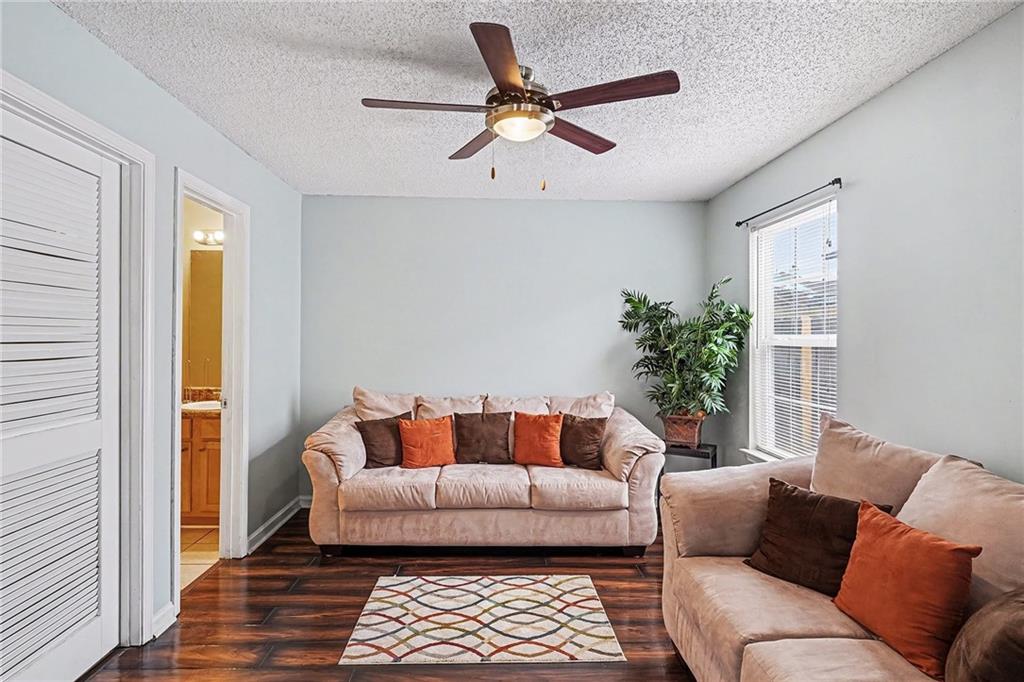 11811 Registry Boulevard Hampton, GA 30228 - Photo 16 of 33 a living room with furniture and a window