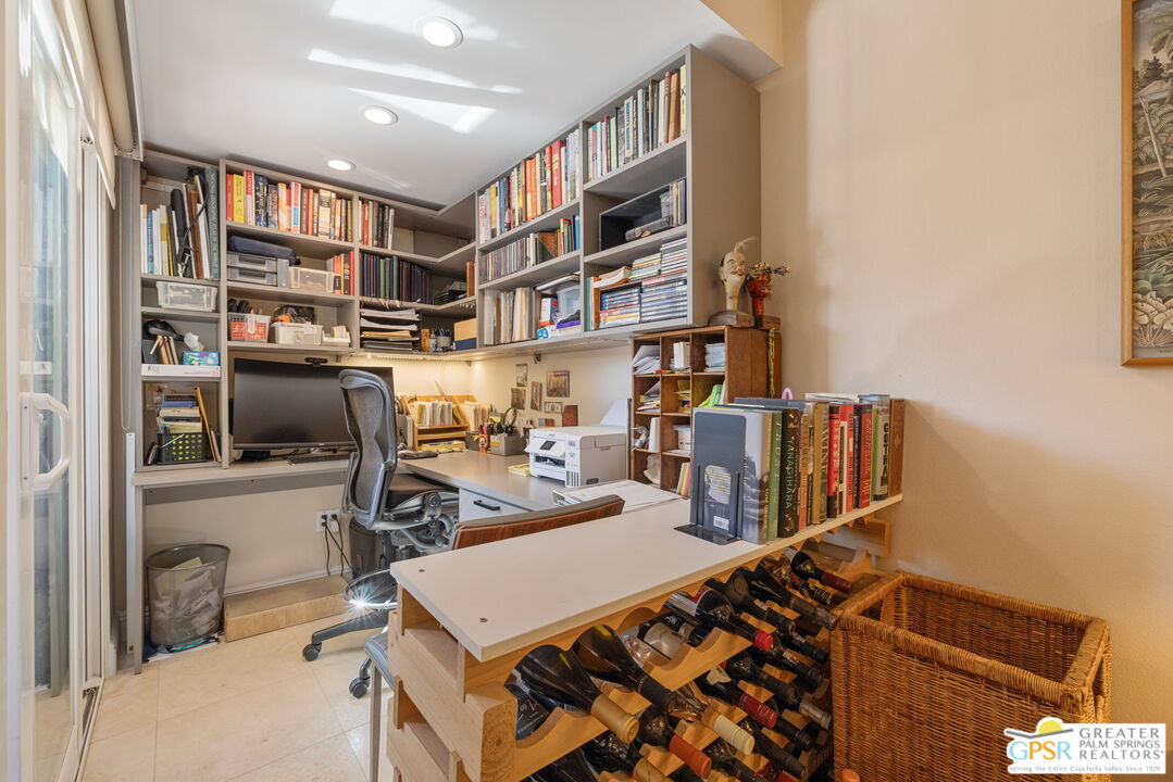 1115 East Alejo Road Palm Springs, CA 92262 - Photo 27 of 40 a view of a workspace with furniture