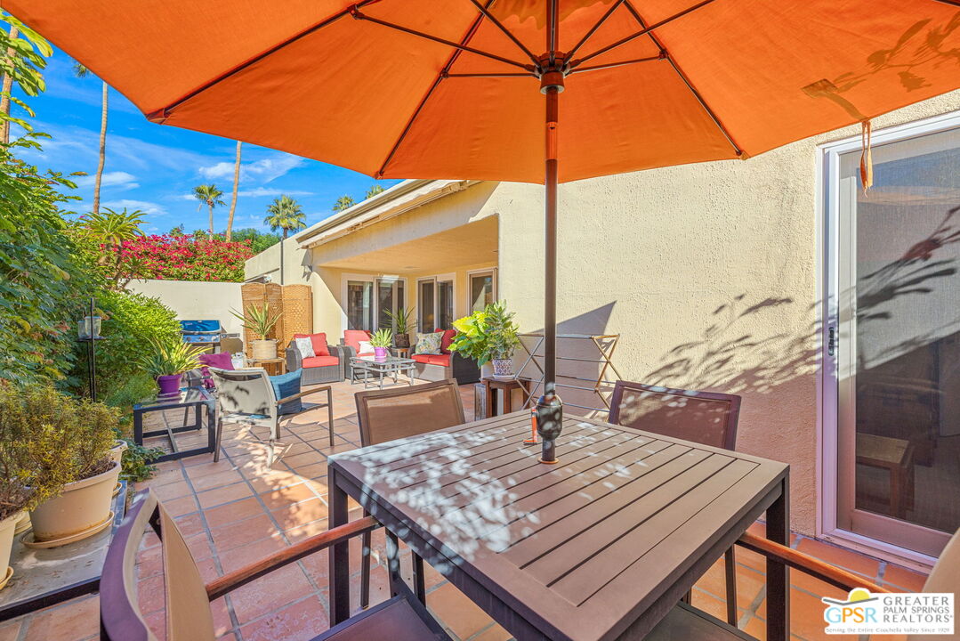 1115 East Alejo Road Palm Springs, CA 92262 - Photo 34 of 40 a view of an outdoor space with furniture