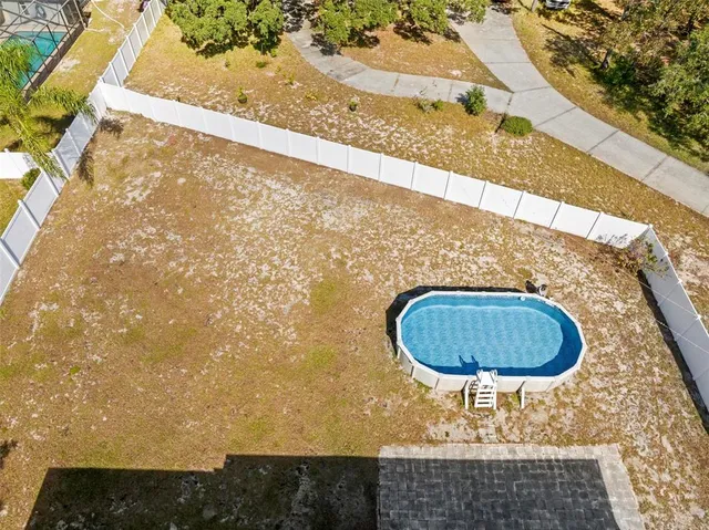 a bathroom with a shower and a curtain