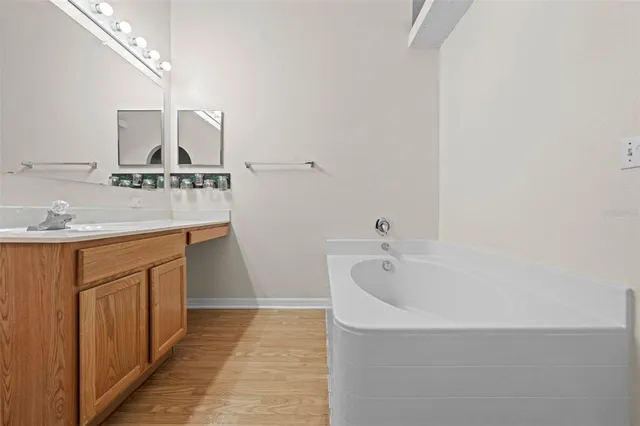 an aerial view of residential house with an outdoor space