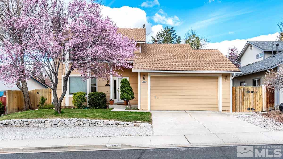 1635 Peavine Road Reno, NV 89503 - Photo 1 of 25 a house that has a tree in front of it