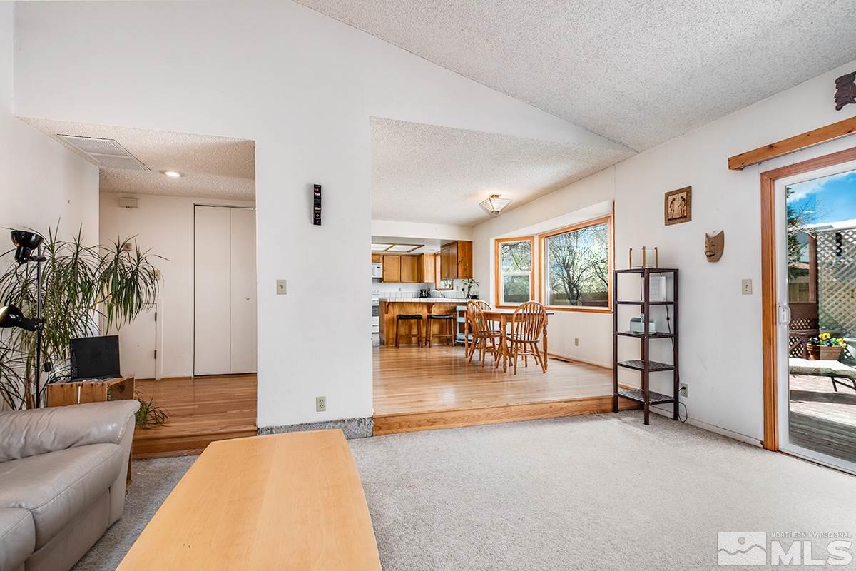 1635 Peavine Road Reno, NV 89503 - Photo 11 of 25 a living room with furniture and a table with potted plant