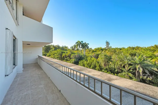a view of a balcony with an outdoor space