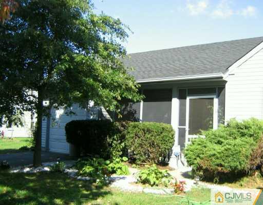 51 Rainford Road Edison, NJ 08820 - Photo 1 of 8 a front view of a house with garden