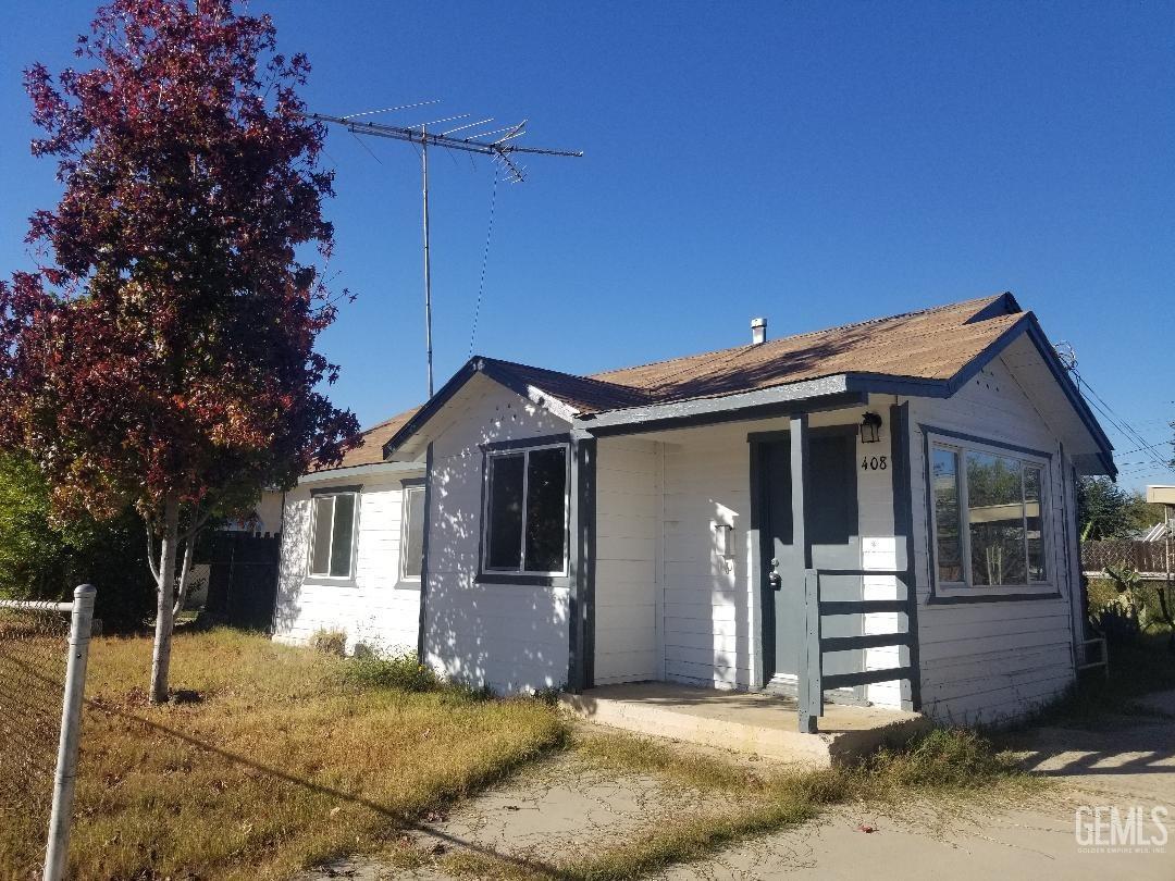 Undisclosed Address Shafter, CA 93263 - Photo 1 of 1 a front view of a house with a porch