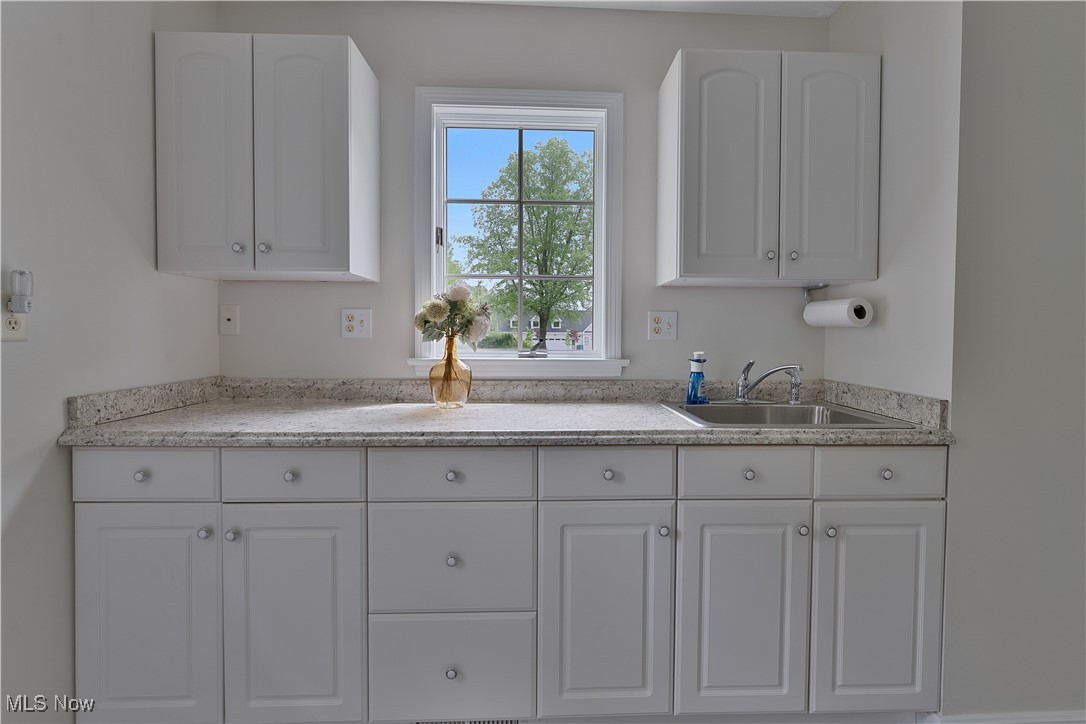 7091 South Raccoon Road Canfield, OH 44406 - Photo 18 of 39 Laundry room sink and counter.