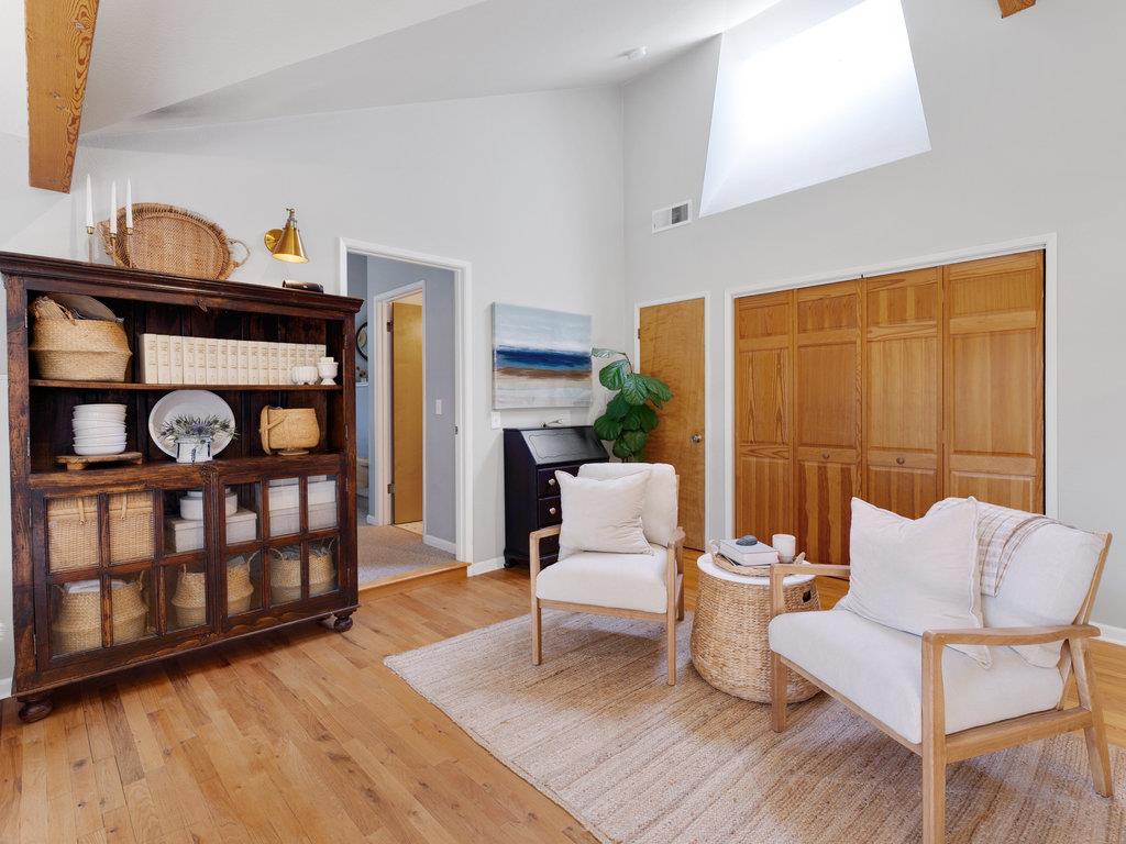 153 Browns Valley Road Corralitos, CA 95076 - Photo 4 of 40 a living room with furniture and a wooden floor