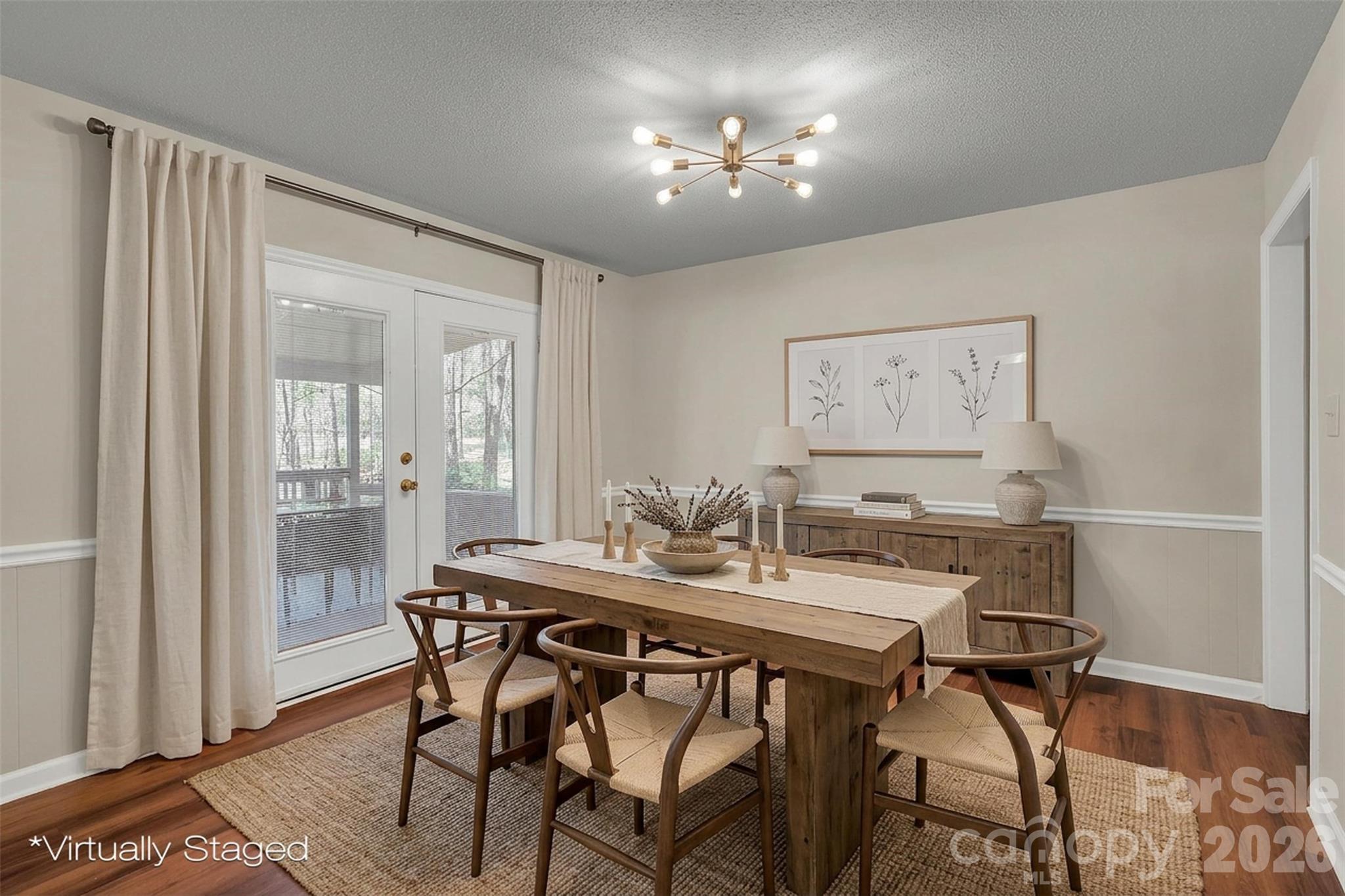 1471 Monroe Highway Lancaster, SC 29720 - Photo 14 of 45 a view of a dining room with furniture and wooden floor