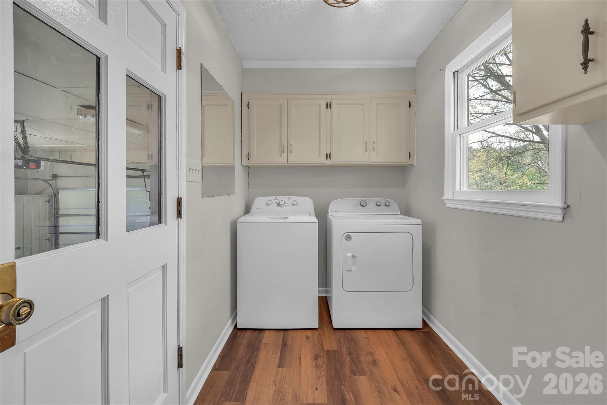 1471 Monroe Highway Lancaster, SC 29720 - Photo 20 of 45 a utility room with wooden floor washer and dryer