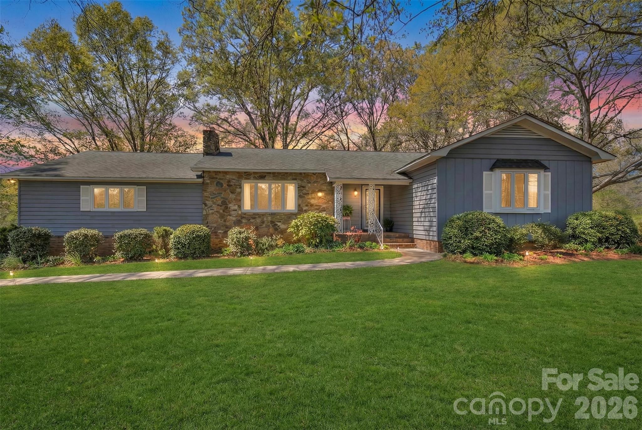 1471 Monroe Highway Lancaster, SC 29720 - Photo 2 of 45 a front view of a house with garden