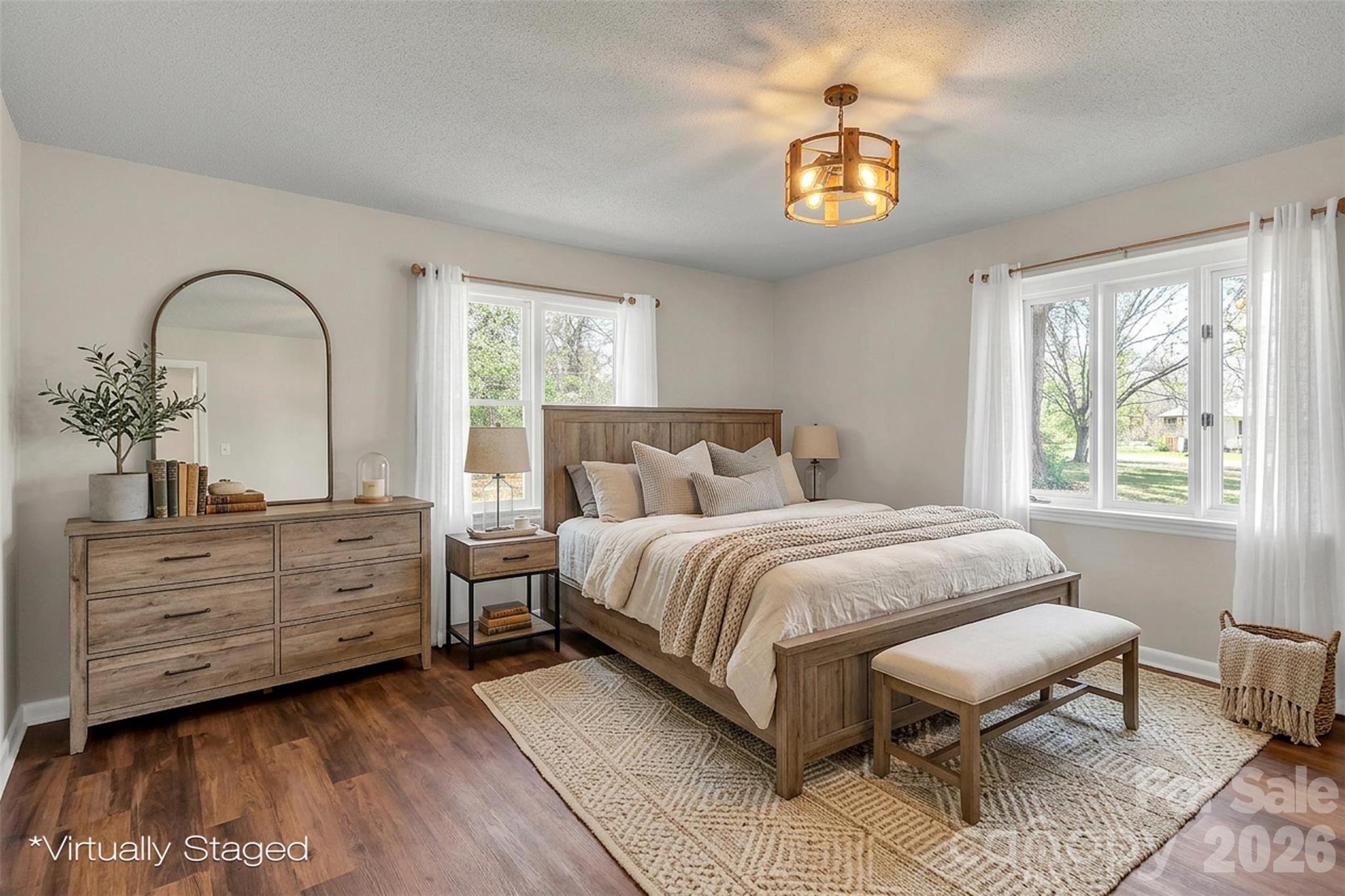 1471 Monroe Highway Lancaster, SC 29720 - Photo 24 of 45 a spacious bedroom with a bed and a chandelier
