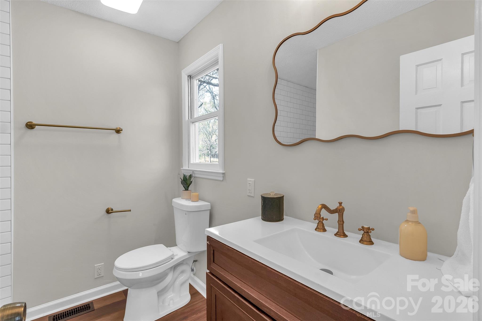 1471 Monroe Highway Lancaster, SC 29720 - Photo 27 of 45 a bathroom with a sink and a toilet