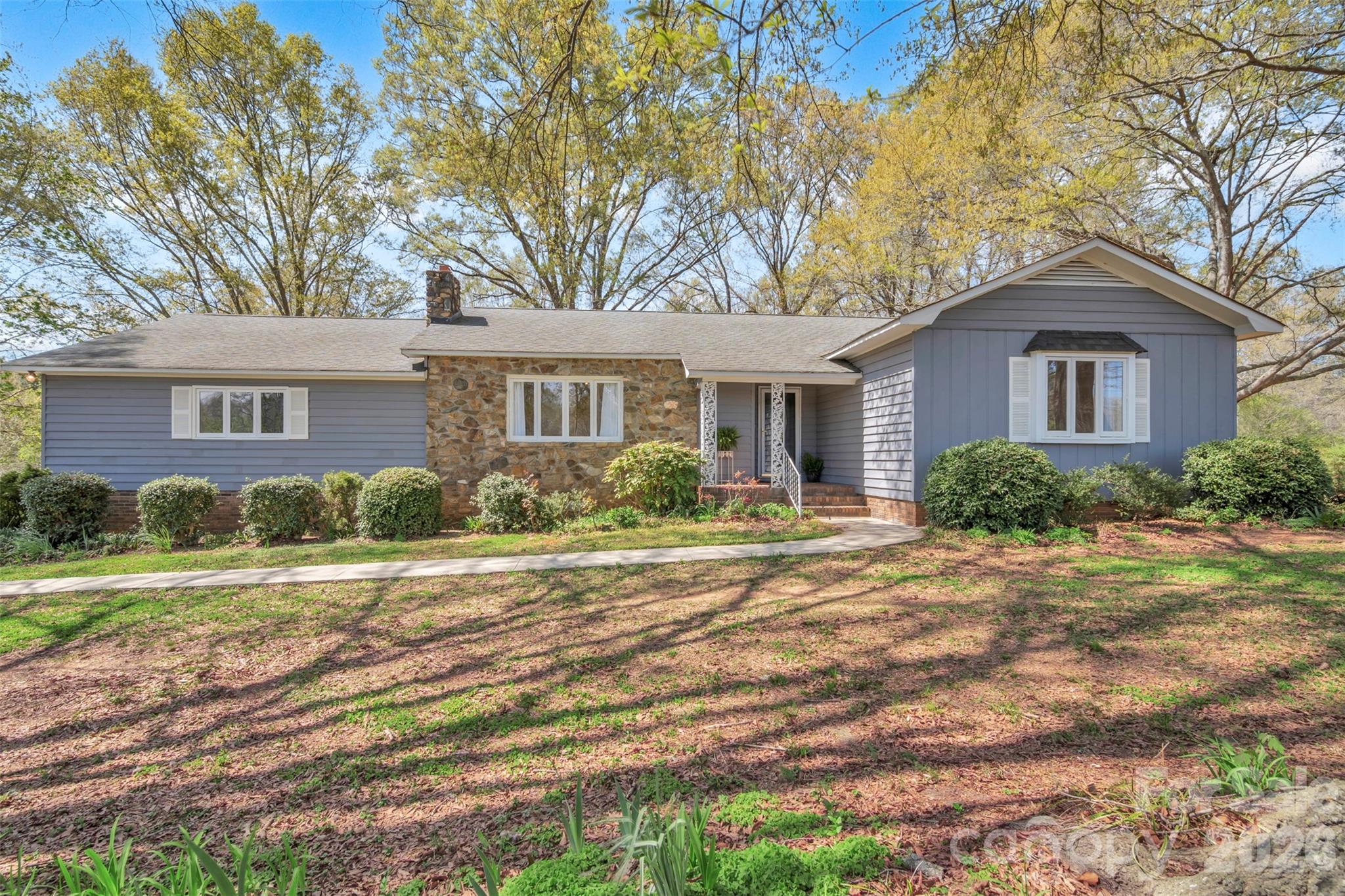 1471 Monroe Highway Lancaster, SC 29720 - Photo 3 of 45 a front view of a house with a yard