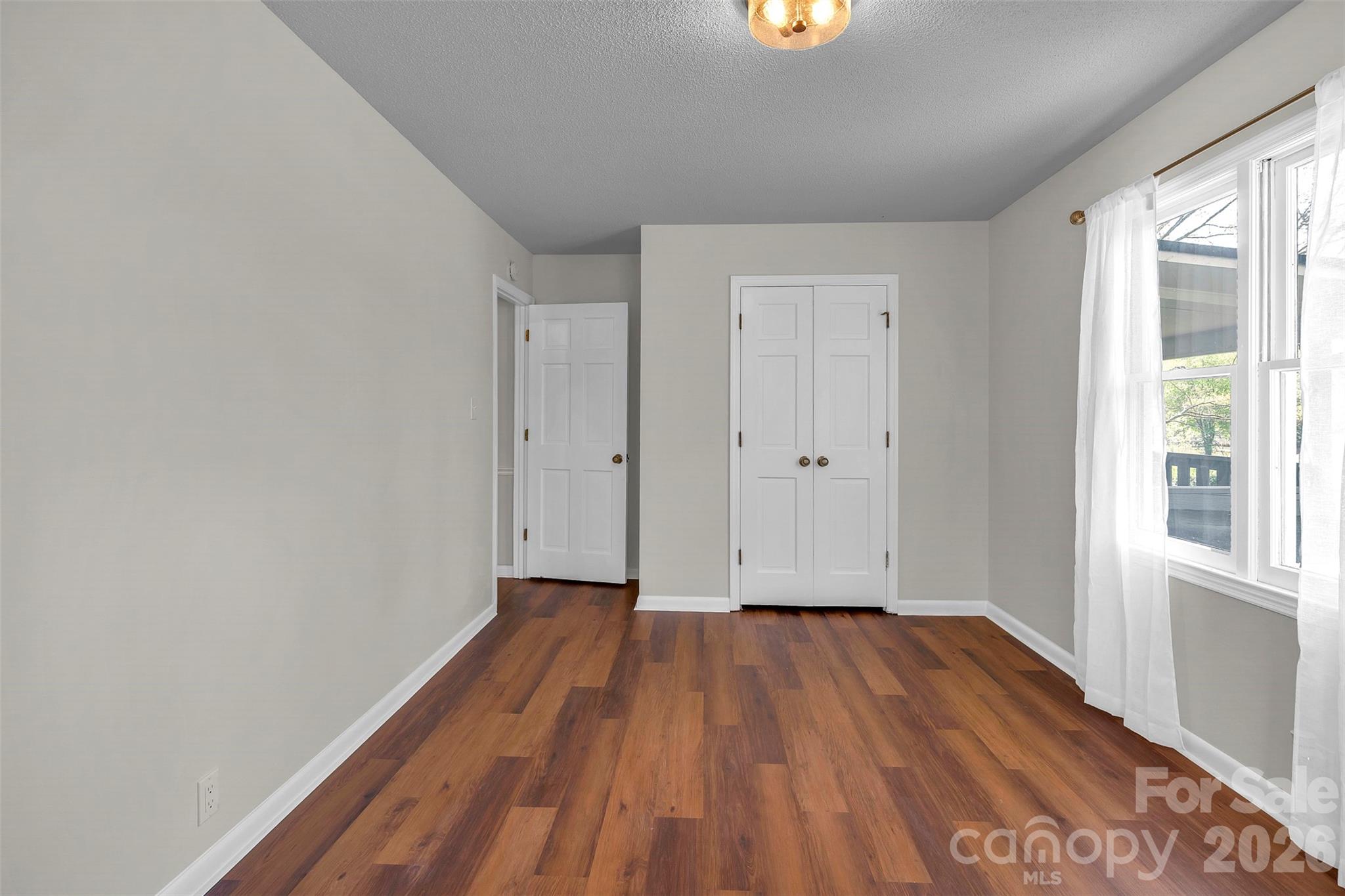 1471 Monroe Highway Lancaster, SC 29720 - Photo 34 of 45 a view of a room with wooden floor and window