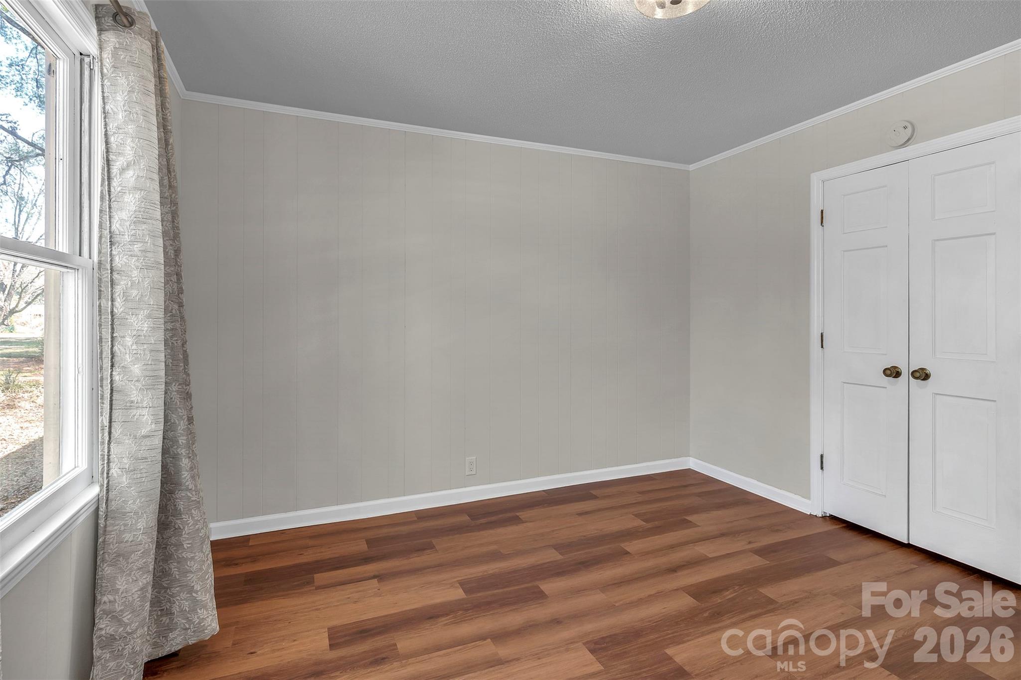 1471 Monroe Highway Lancaster, SC 29720 - Photo 35 of 45 a view of room with window and wooden floor