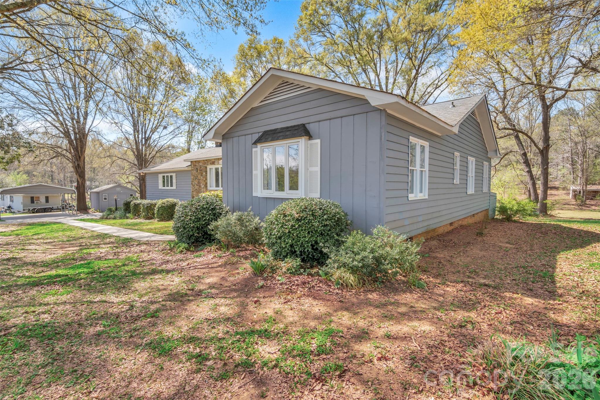 1471 Monroe Highway Lancaster, SC 29720 - Photo 5 of 45 a front view of a house with garden