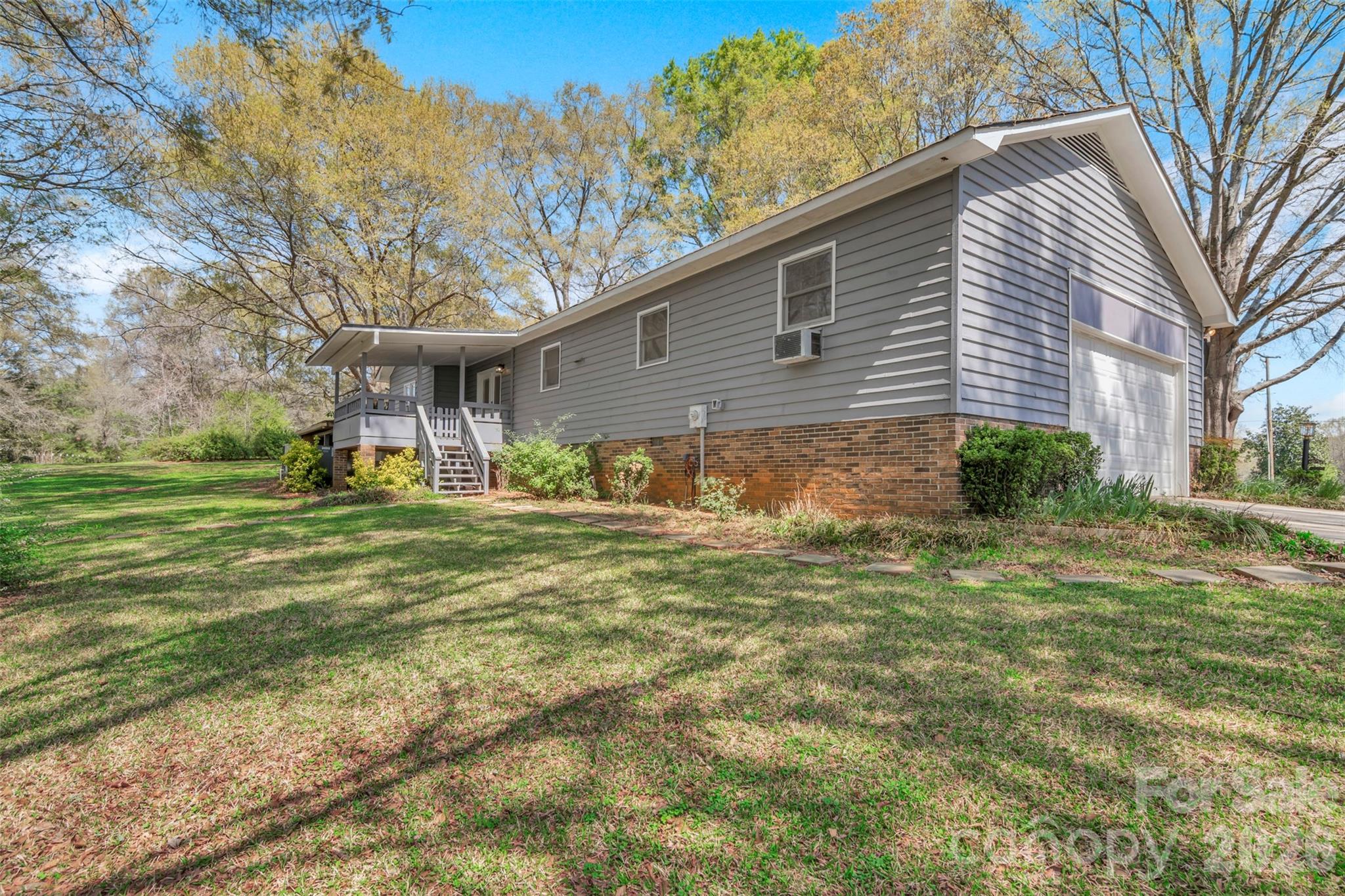 1471 Monroe Highway Lancaster, SC 29720 - Photo 7 of 45 a front view of a house with a yard