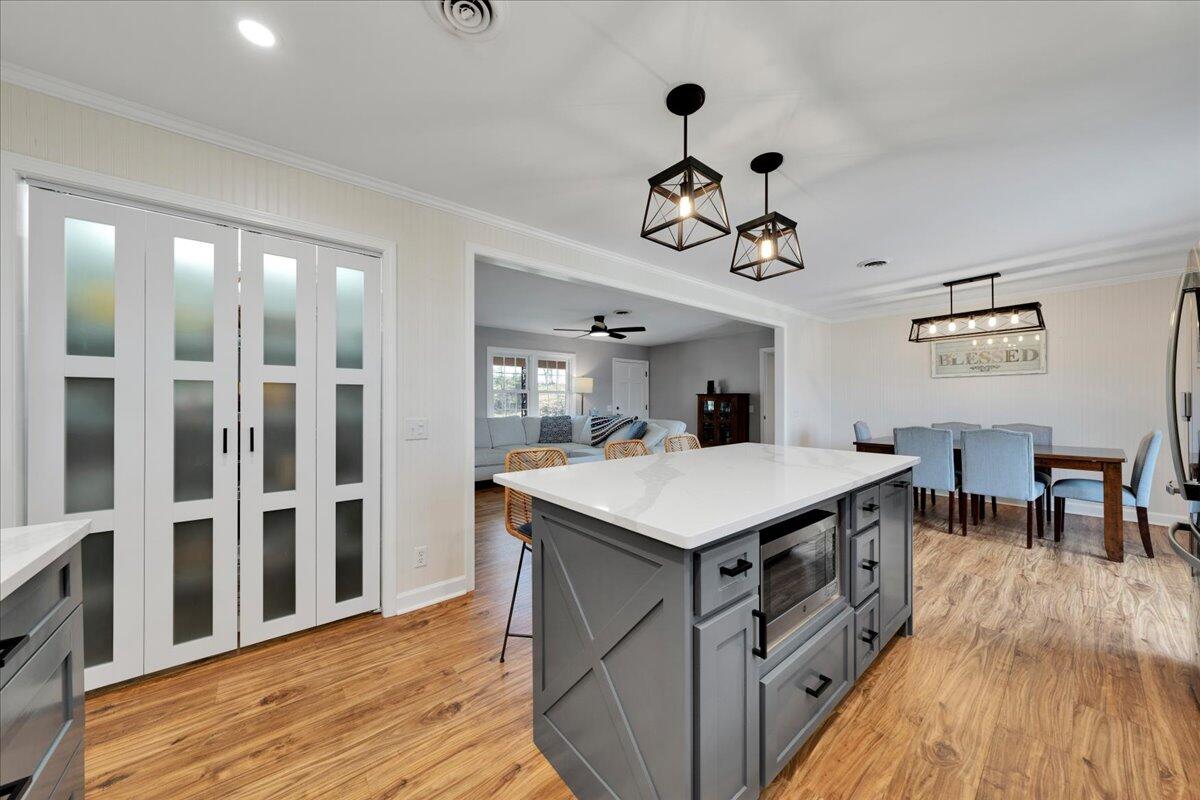 4660 Franklin Street Rocky Mount, VA 24151 - Photo 15 of 55 a kitchen with a counter space a sink appliances and a dining table