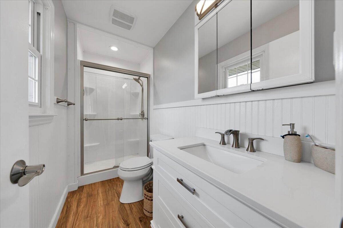 4660 Franklin Street Rocky Mount, VA 24151 - Photo 21 of 55 a bathroom with a sink toilet and a shower