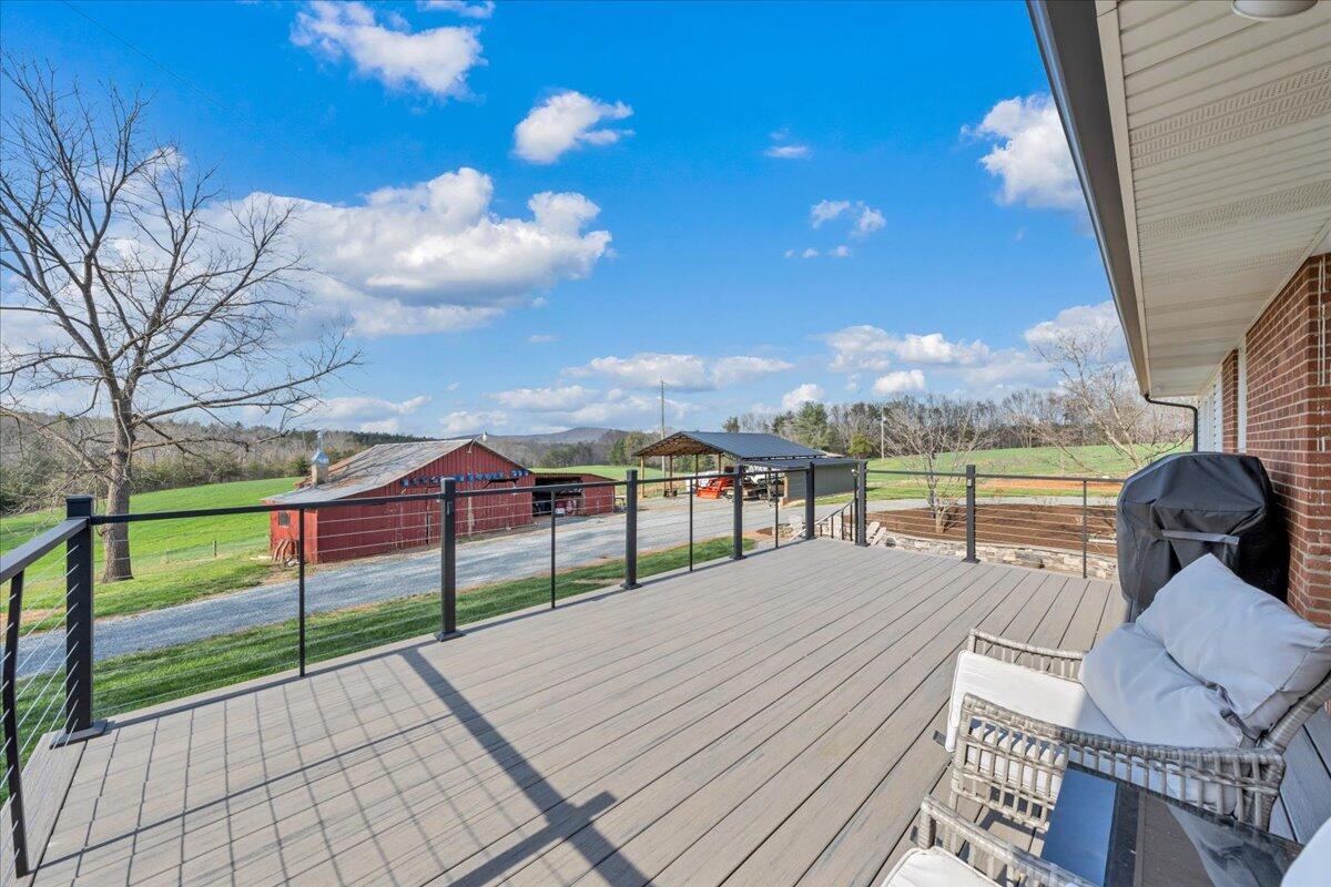 4660 Franklin Street Rocky Mount, VA 24151 - Photo 34 of 55 a view of a balcony with wooden floor and fence