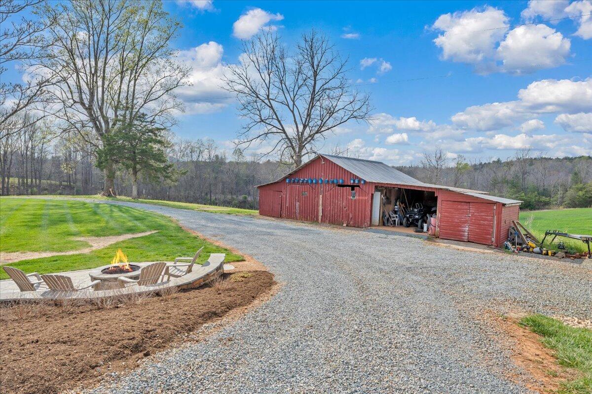 4660 Franklin Street Rocky Mount, VA 24151 - Photo 40 of 55 a front view of a house with a yard and garage