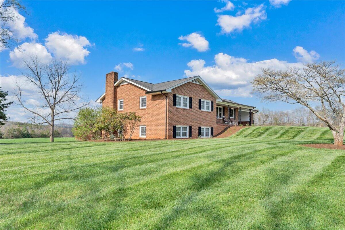 4660 Franklin Street Rocky Mount, VA 24151 - Photo 49 of 55 a front view of a house with a yard