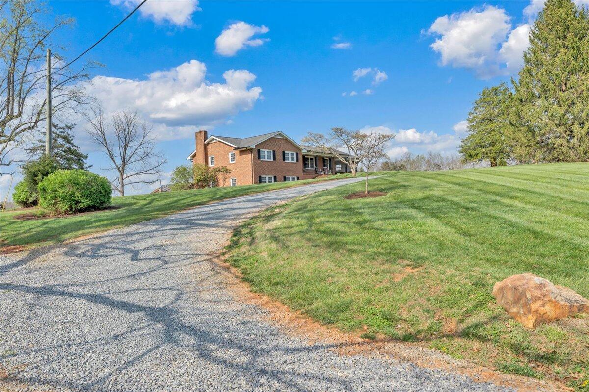 4660 Franklin Street Rocky Mount, VA 24151 - Photo 50 of 55 a front view of a house with a yard