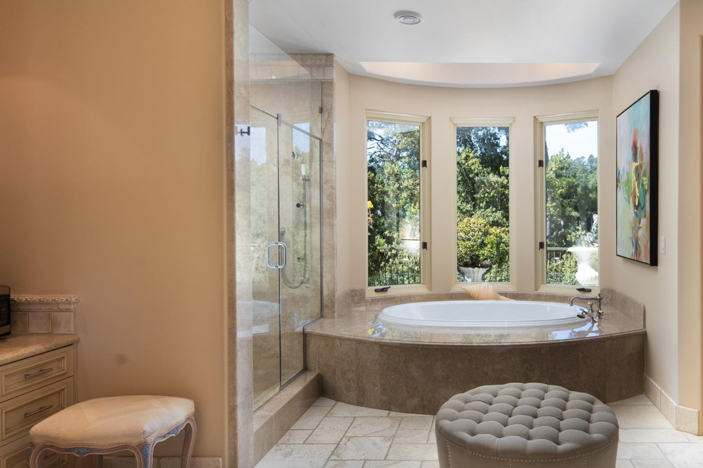 24316 Monterra Woods Monterey, CA 93940 - Photo 11 of 31 a bathroom with a bathtub and window