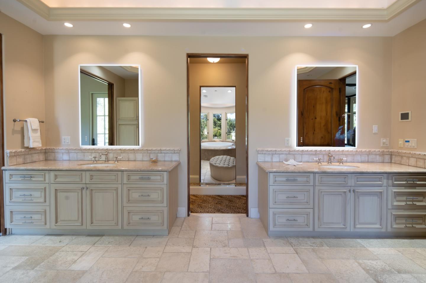 24316 Monterra Woods Monterey, CA 93940 - Photo 12 of 31 a bathroom with a granite countertop sink and a mirror