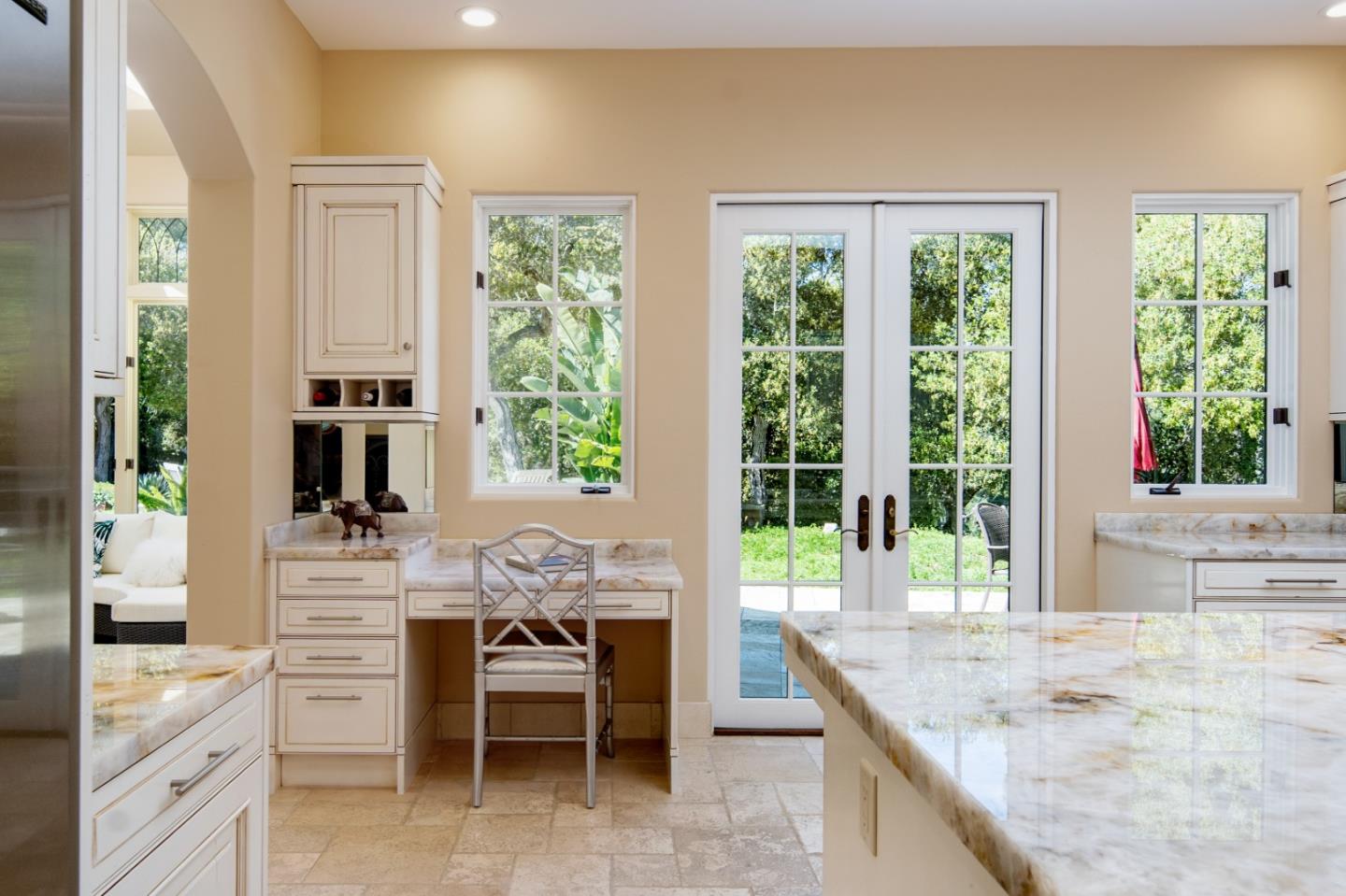 24316 Monterra Woods Monterey, CA 93940 - Photo 16 of 31 a dining hall with stainless steel appliances granite countertop a stove and large window