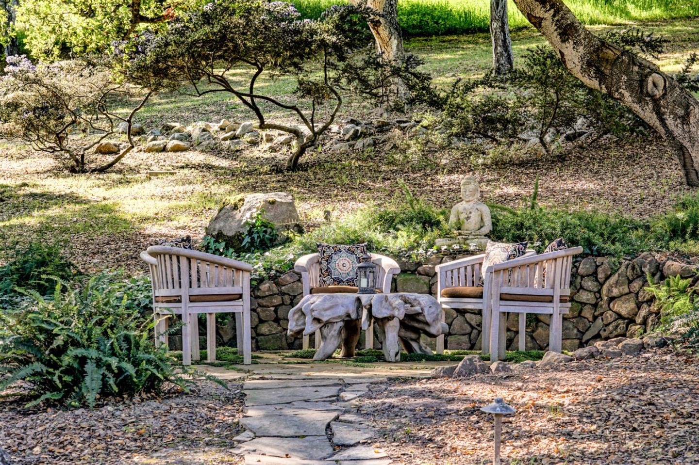 24316 Monterra Woods Monterey, CA 93940 - Photo 30 of 31 a front view of a house with a garden