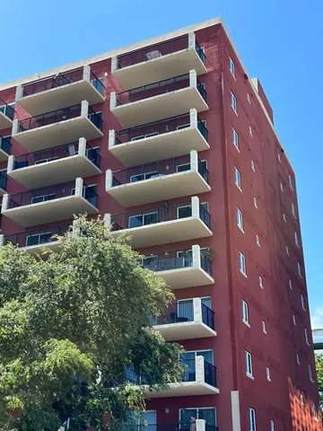 a view of street with building in front of it