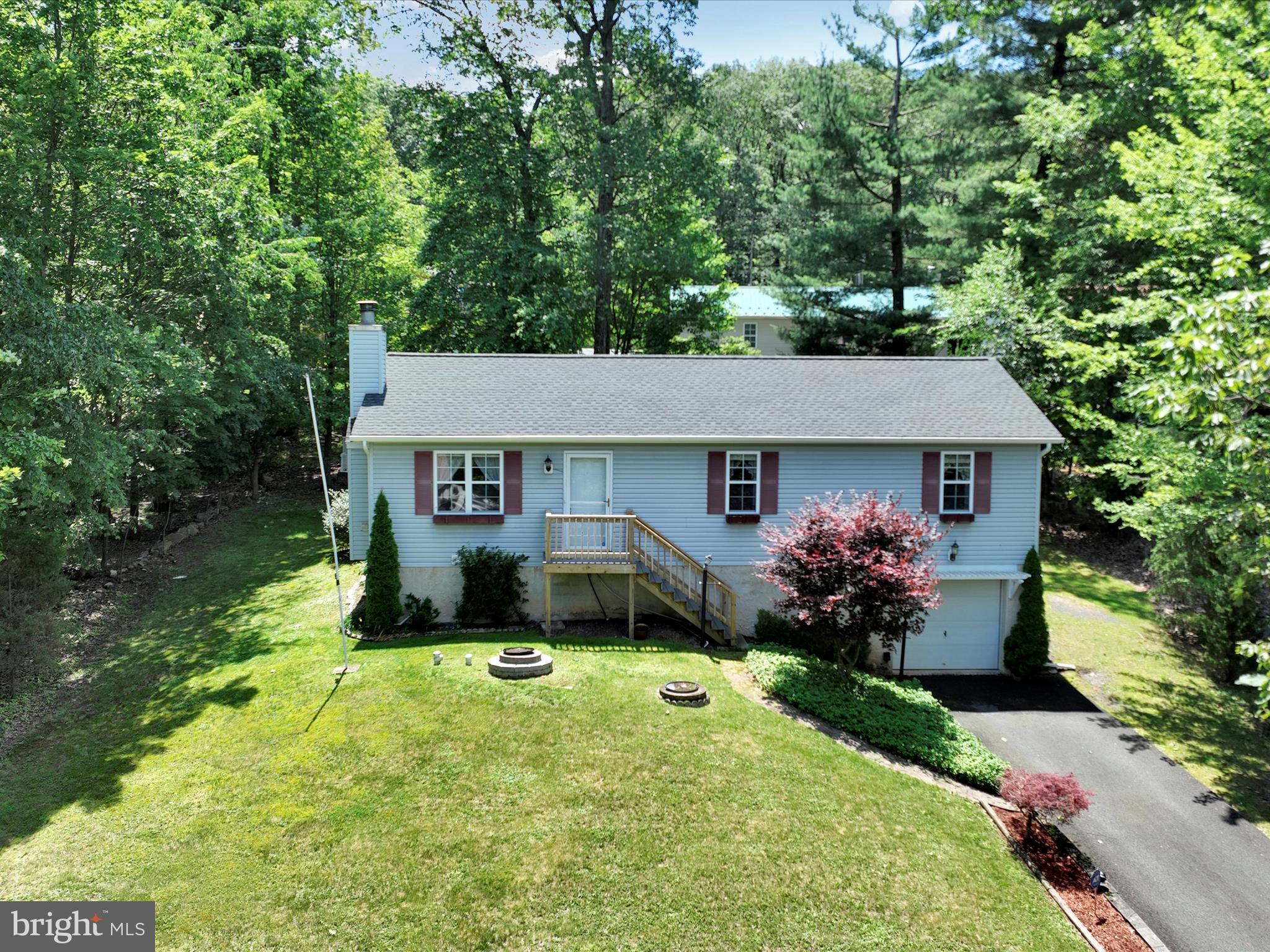95 Comanche Drive Auburn, PA 17922 - Photo 27 of 33 a front view of a house with garden
