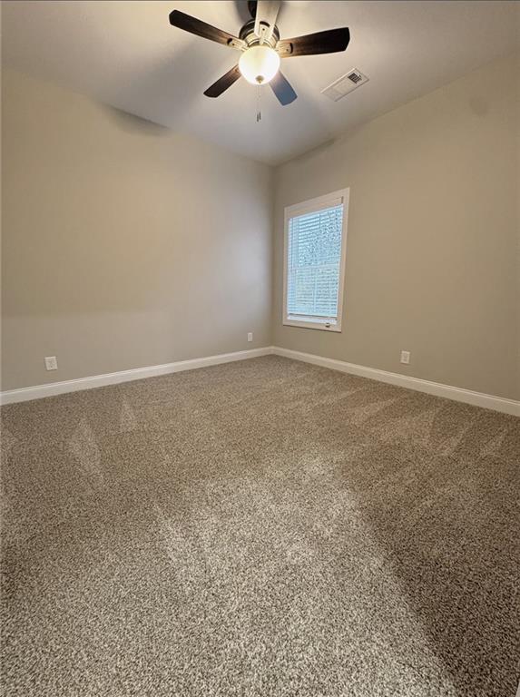 7217 King Road Valley, AL 36854 - Photo 10 of 14 Empty room featuring baseboards and carpet flooring
