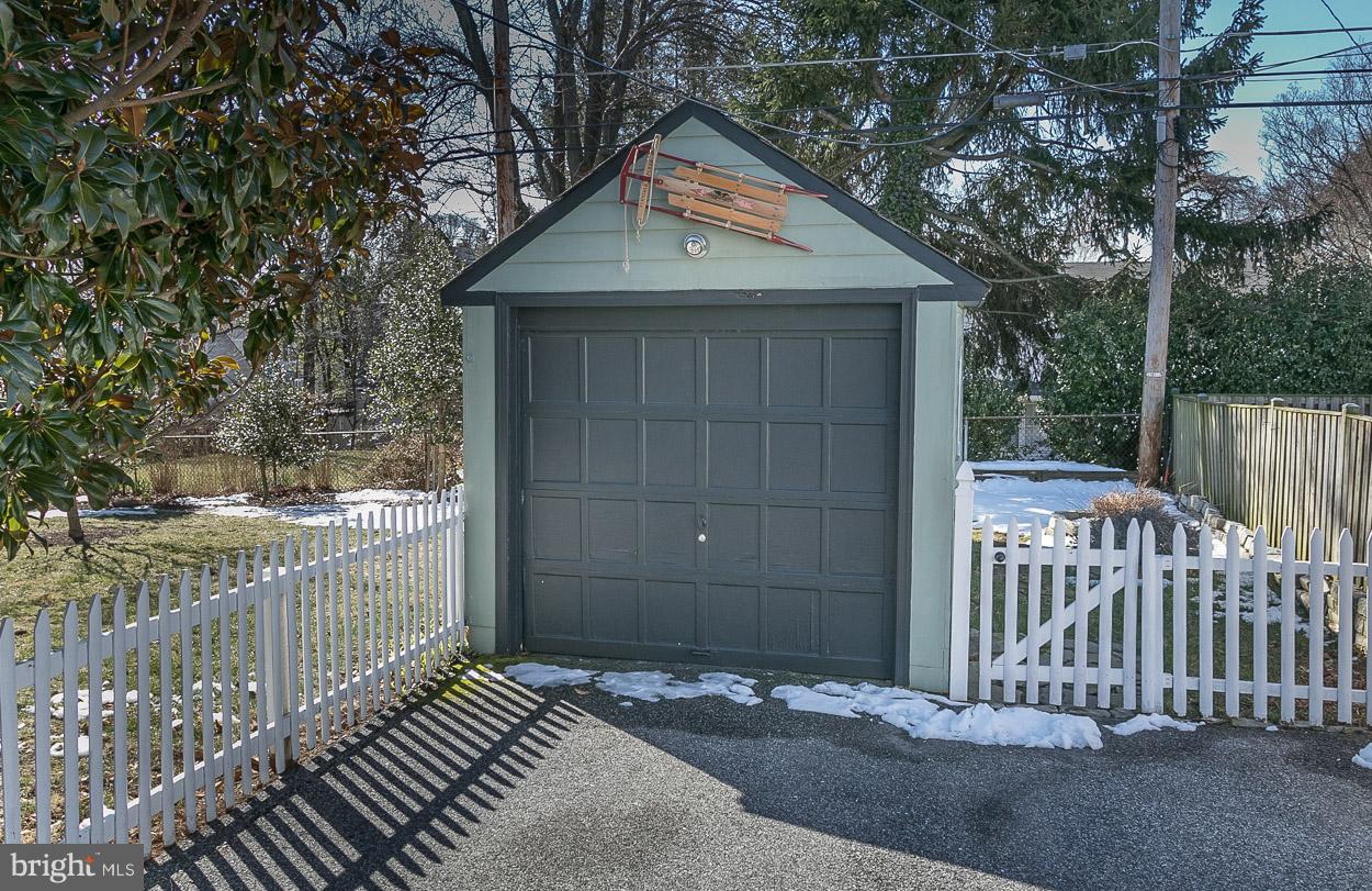513 Wilton Road Baltimore, MD 21286 - Photo 2 of 30 a side view of a house with a small yard