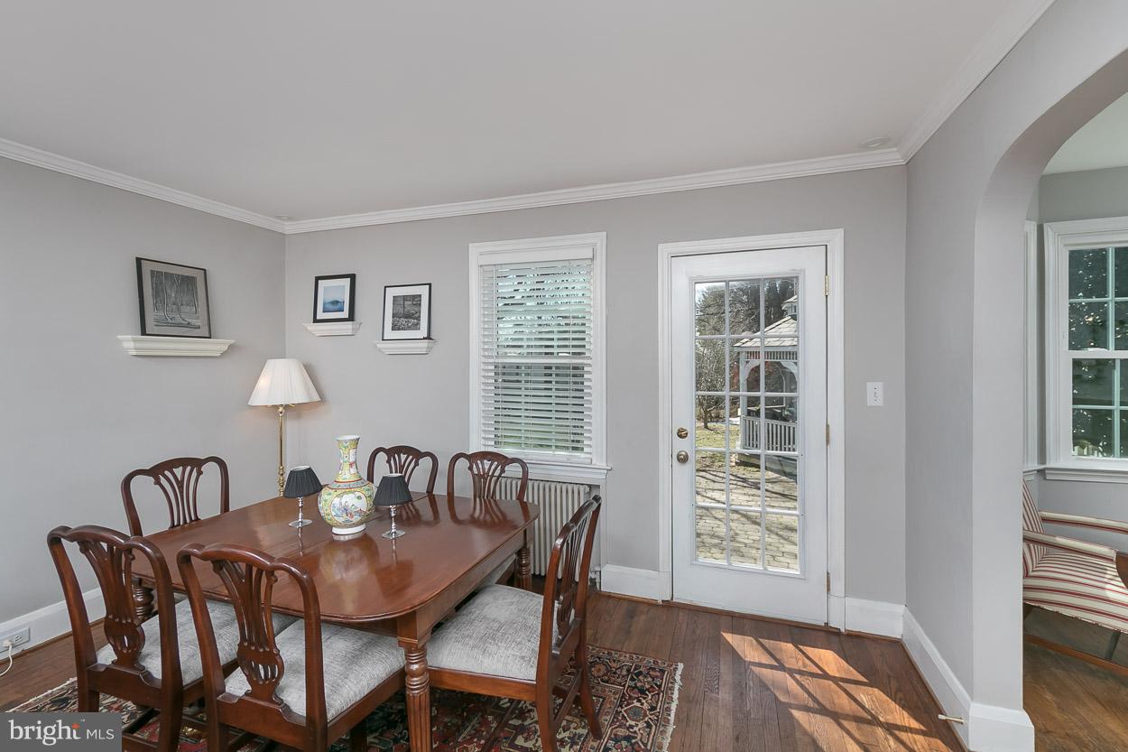 513 Wilton Road Baltimore, MD 21286 - Photo 12 of 30 a view of a dining room with furniture and wooden floor