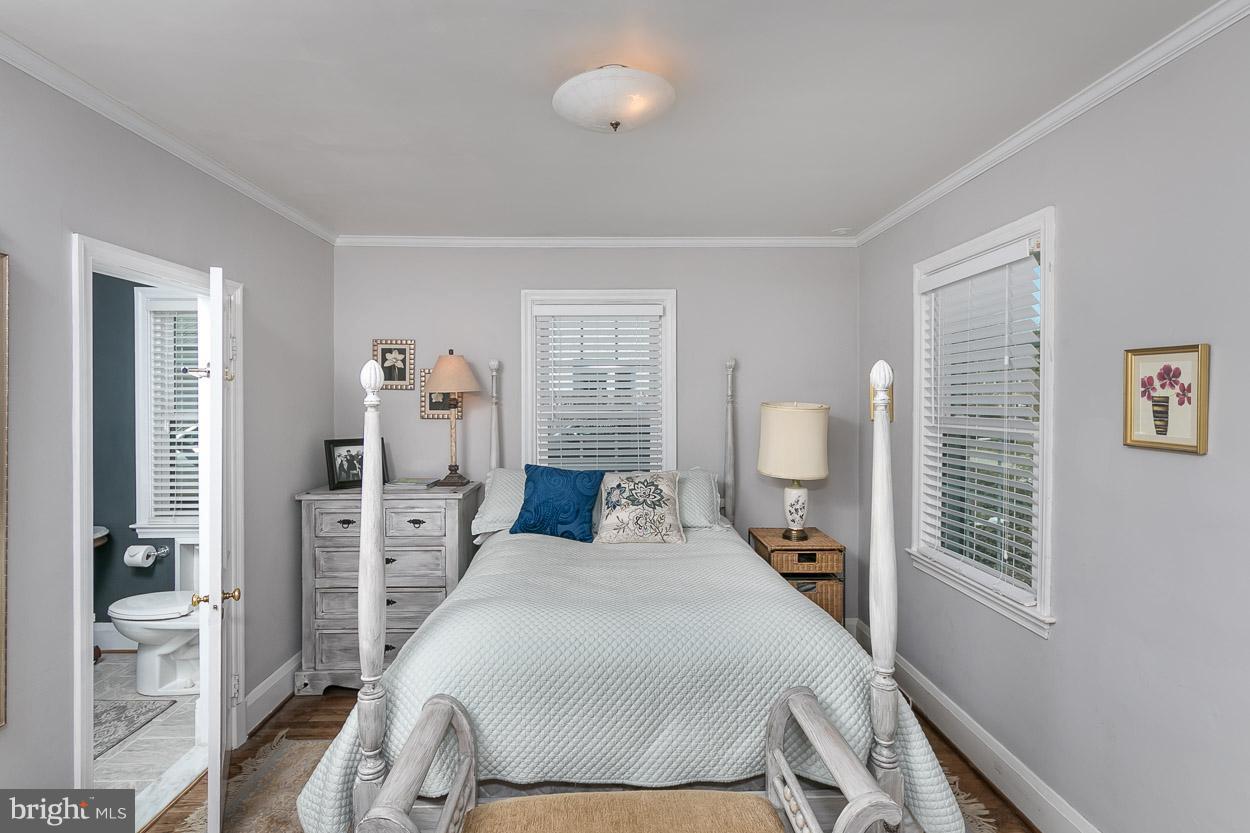 513 Wilton Road Baltimore, MD 21286 - Photo 20 of 30 a bedroom with a bed and large window