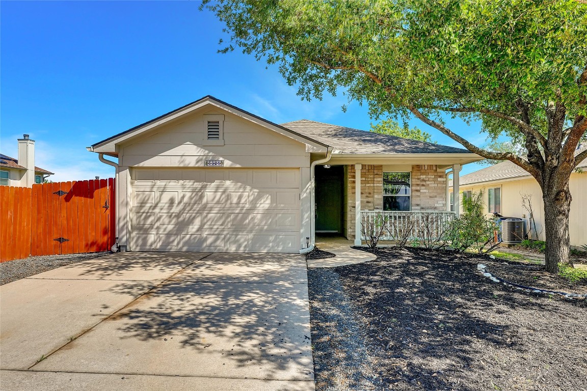5321 Tower Trail Austin, TX 78723 - Photo 1 of 1 a front view of a house with a yard