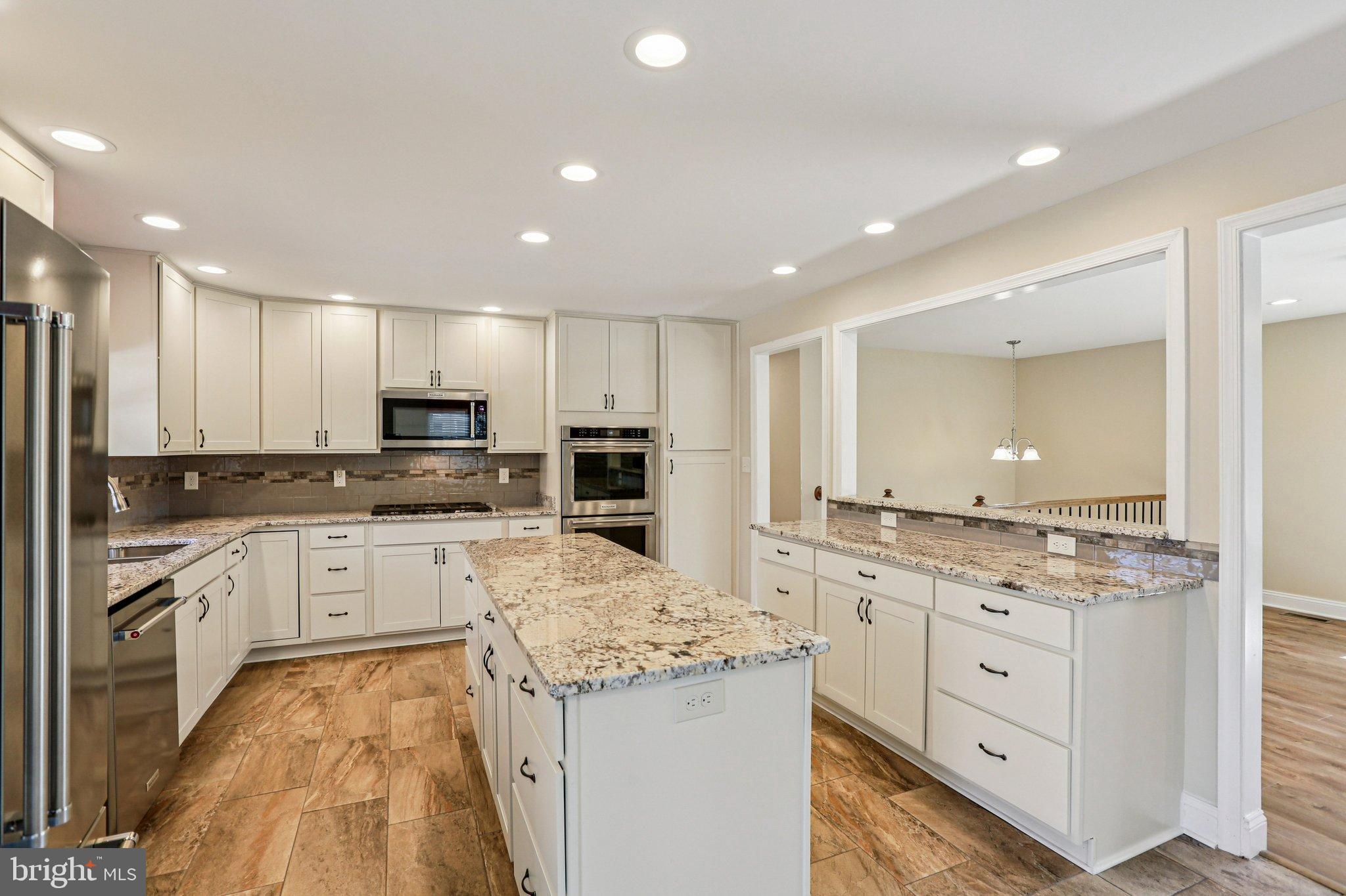 306 Christy Road Pasadena, MD 21122 - Photo 1 of 58 Modern kitchen with elegant finishes.