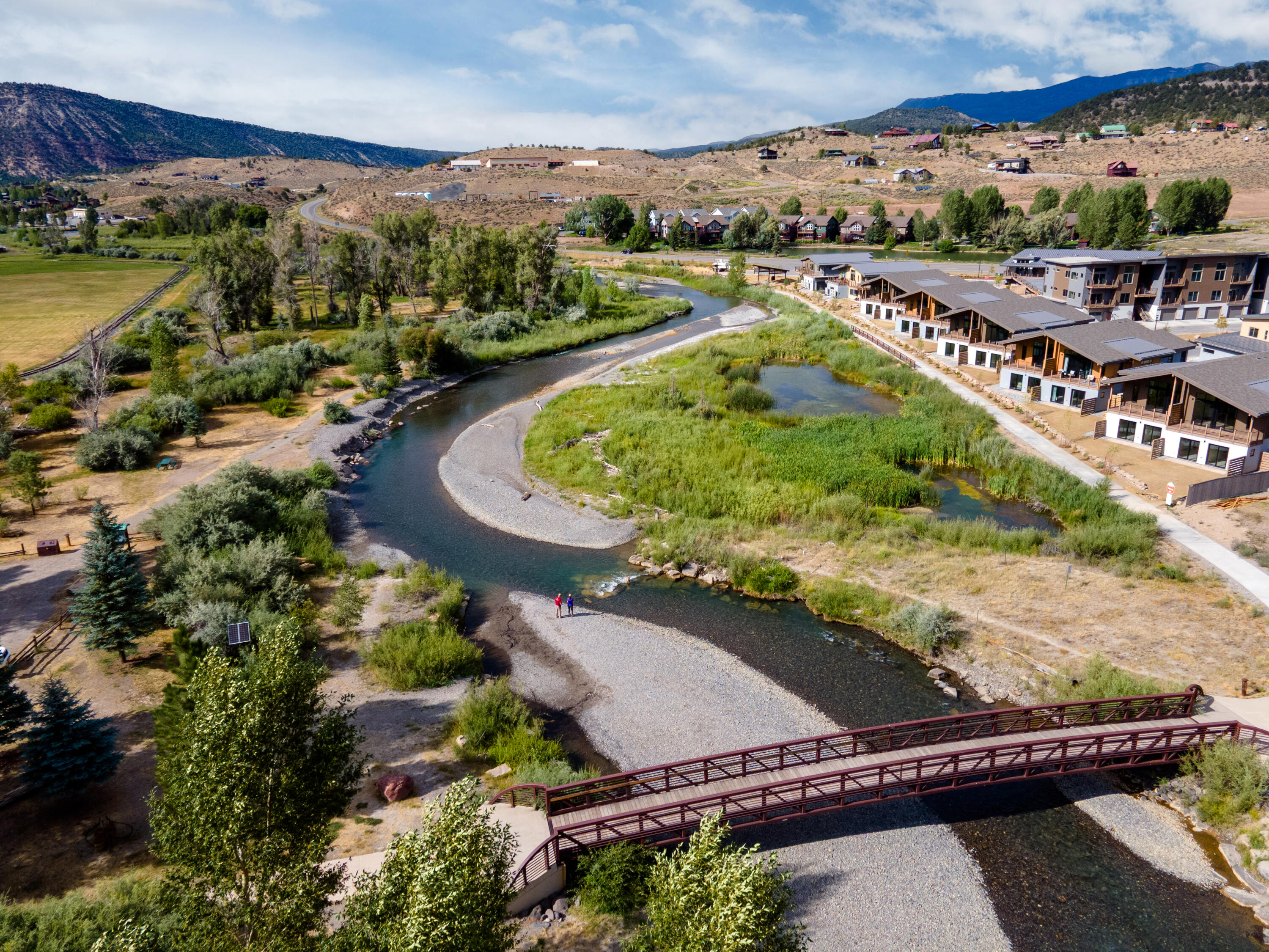 205 Jasper Place, Unit 203 Ridgway, CO 81432 - Photo 4 of 8 an aerial view of a residential houses with outdoor space and street view