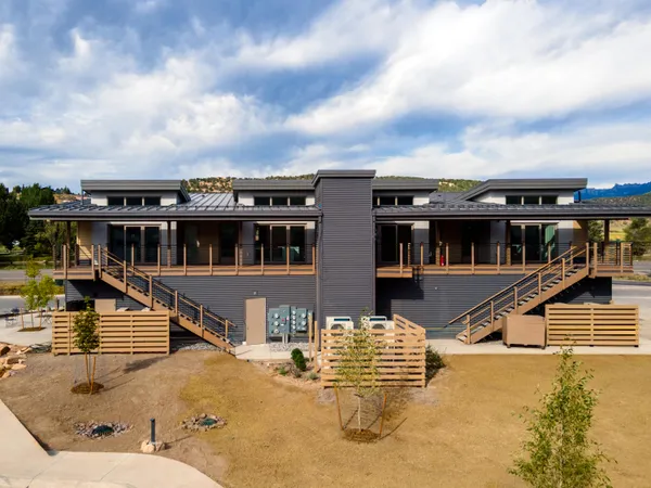 a view of a house with swimming pool