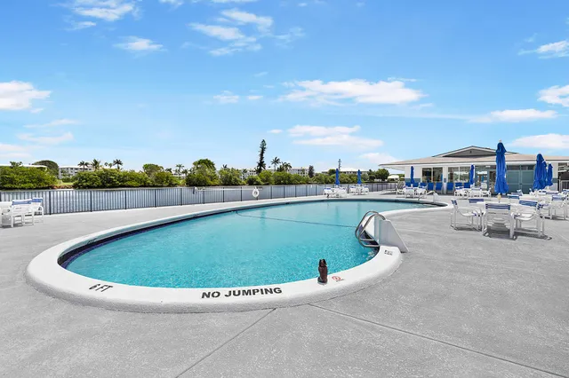a view of a swimming pool and lake view
