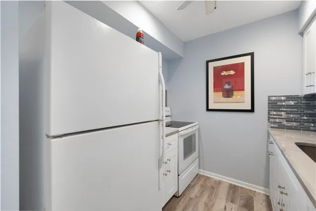 a view of hallway with washer and dryer